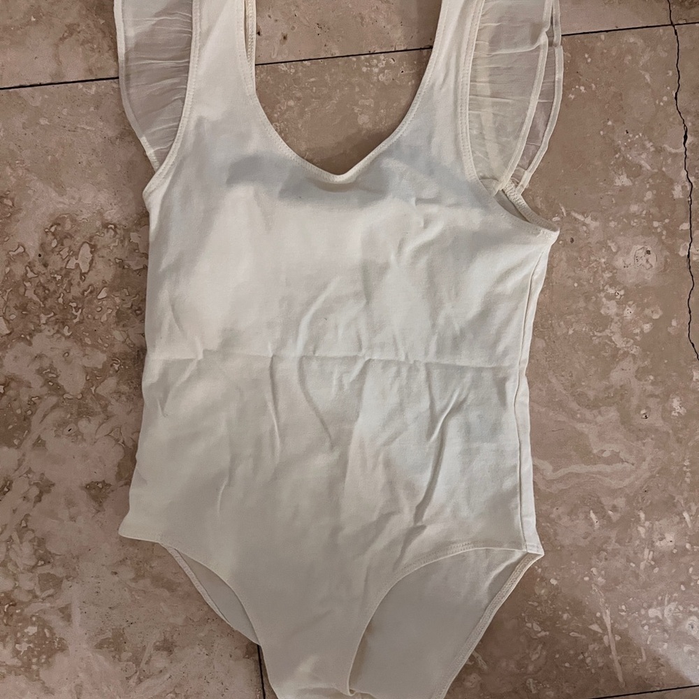 Cream Sleeveless Bodysuit with Ruffle Detail